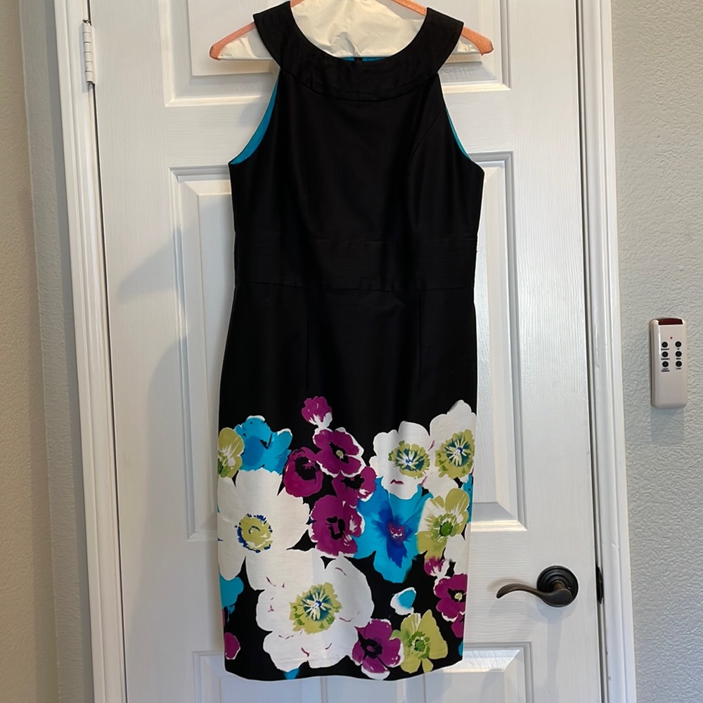 Black tank dress with bright floral accent along bottom by Muse Women’s Size 8